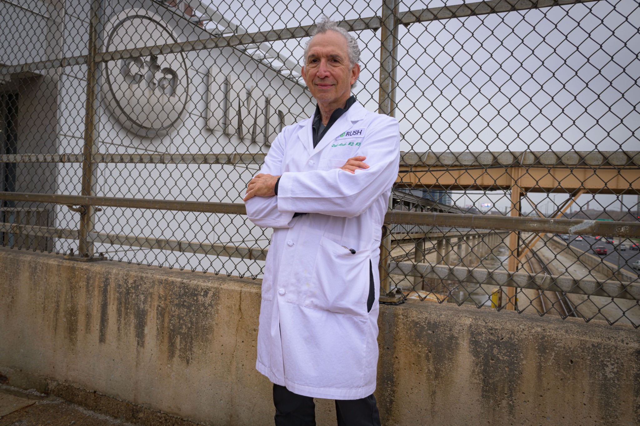 David Ansell standing near Chicago's Blue Line